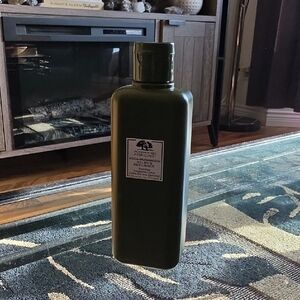 Origins Mega-Mushroom Relief Essence - Olive Green Bottle